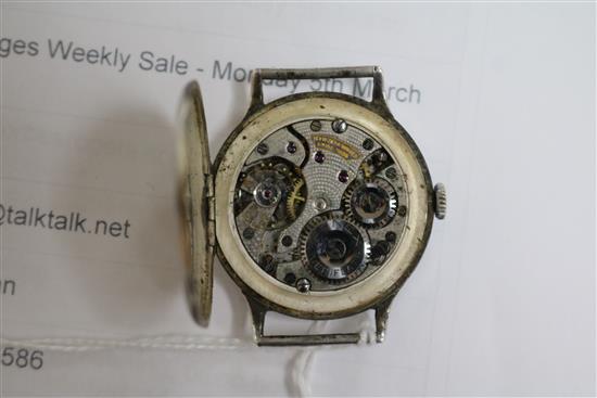 A gentlemans late 1920s silver Genex manual wind wrist watch with sunburst dial (no strap).